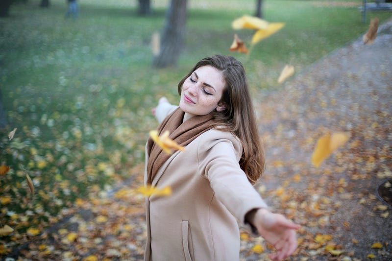 Woman embracing the beauty of life in nature