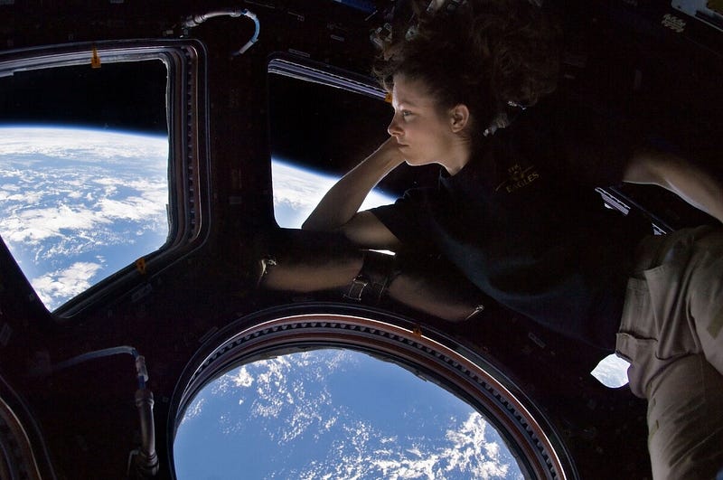 Astronauts enjoying a view of Earth from the ISS