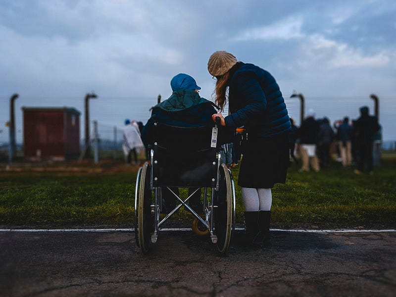 Individual in a wheelchair, highlighting the need for inclusion.