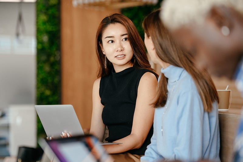 Woman appearing disengaged in a conversation