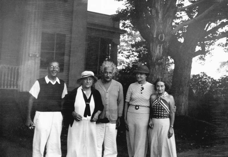 Einstein and Konenkova with friends at a gathering