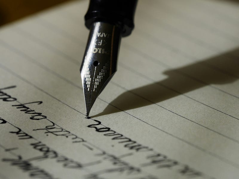 Quiet reflection with a desk lamp and papers