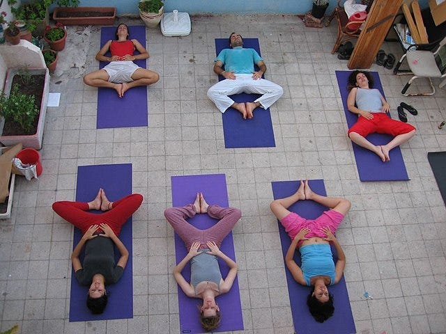 Reclining Cobbler’s Pose demonstration