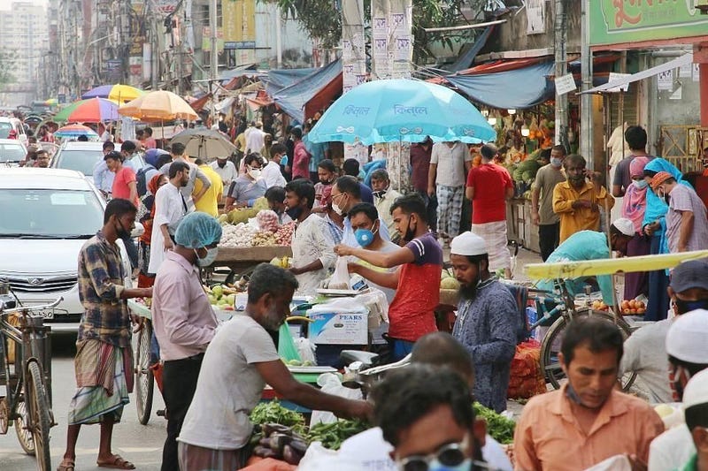 A crowded area without social distancing measures.